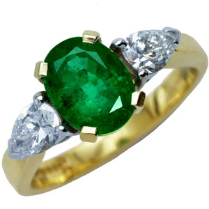 Oval Emerald and Diamond Trilogy Dress Ring. 18ct Gold. - Click Image to Close